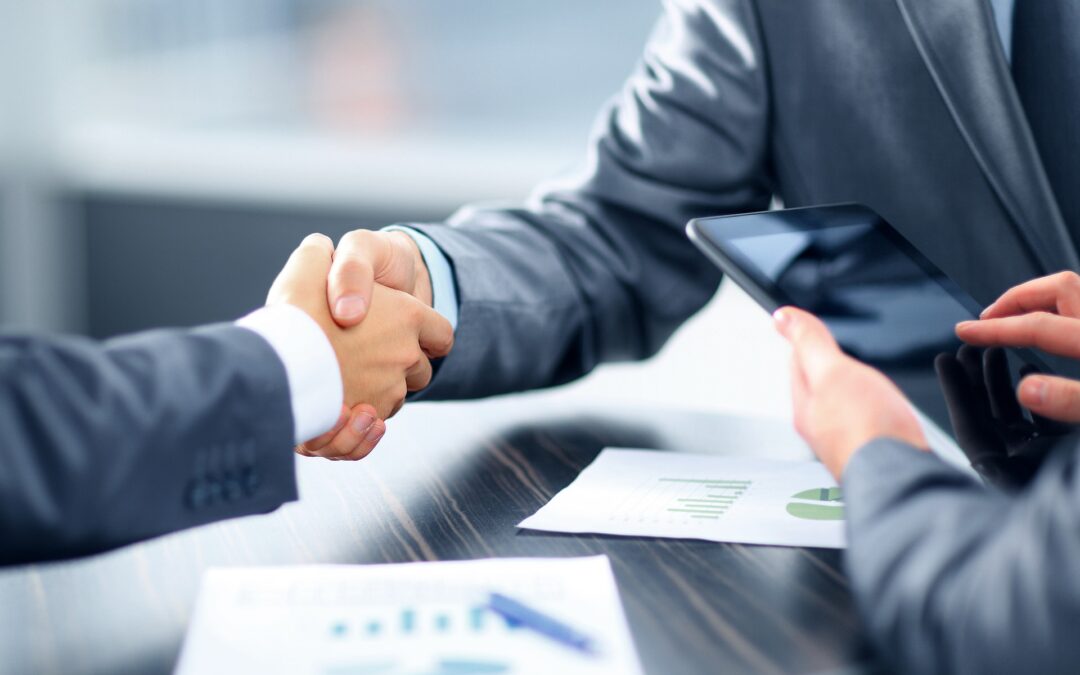 Shaking Hands After Securing a Bridge Loan for a Real Estate Investment